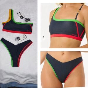 Rip Curl Gigi One Shoulder Top & Victoria
Vergara 80's Hi Leg Skimpy Coverage
